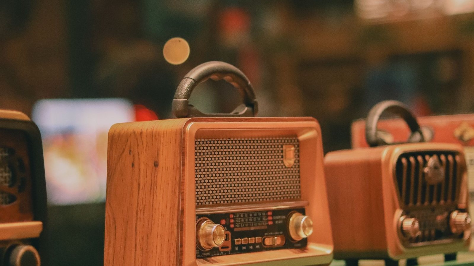 Retro style radio receivers on a shelf