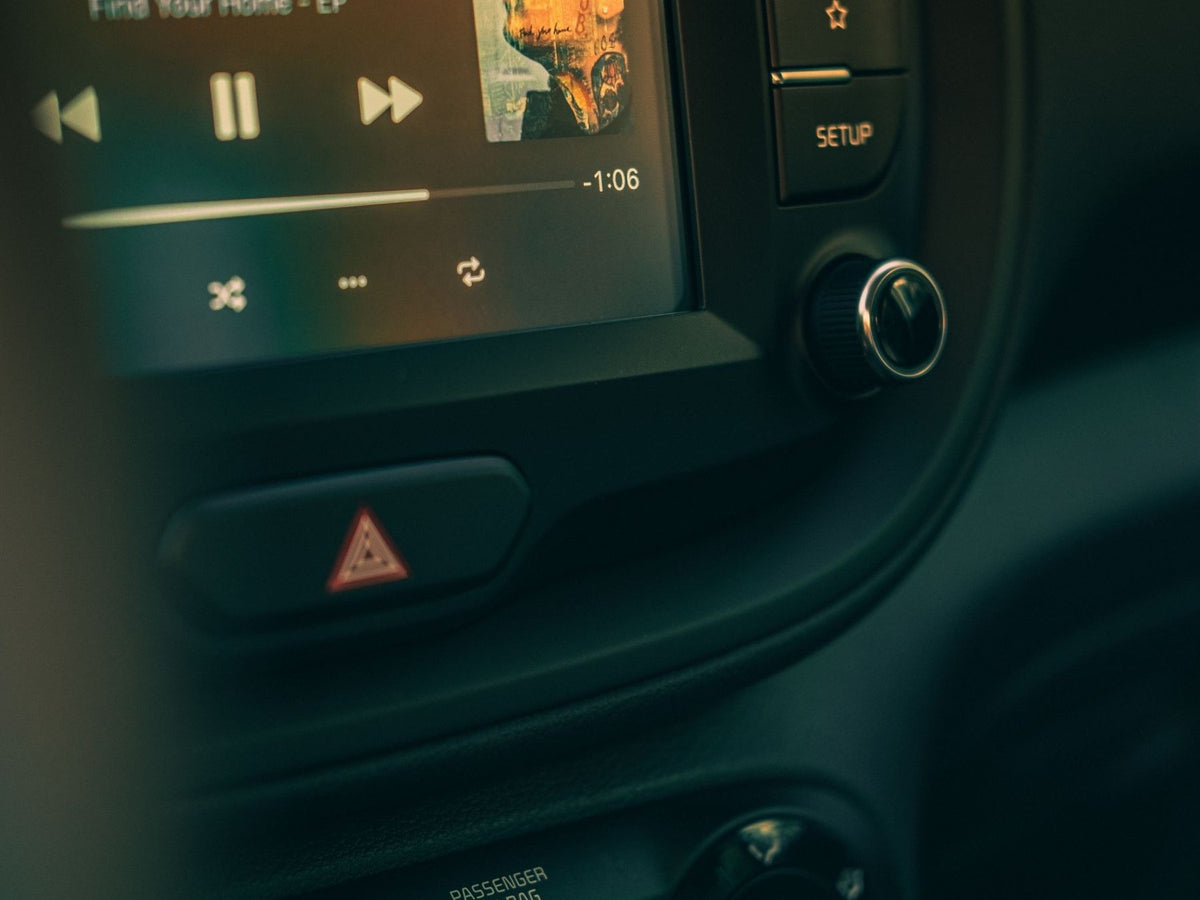 Car dashboard head unit with the audio display lit